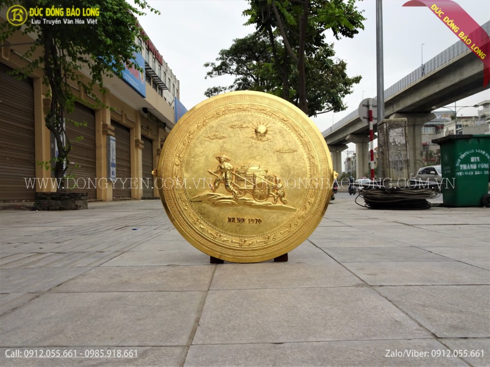 hình ảnh người mẹ kéo lúa