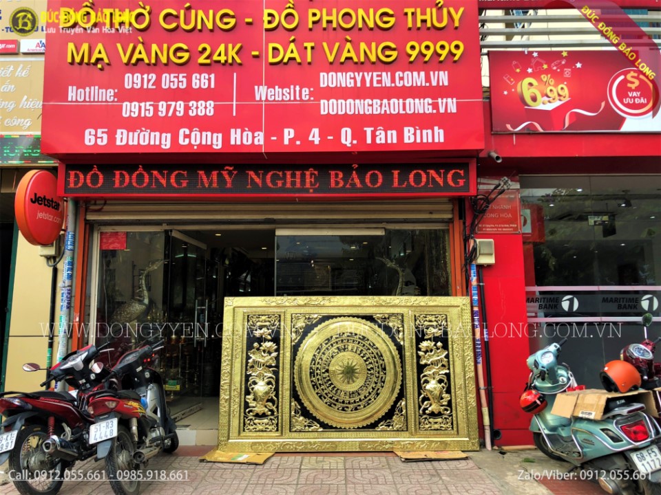 tranh mặt trống đồng hoa sen