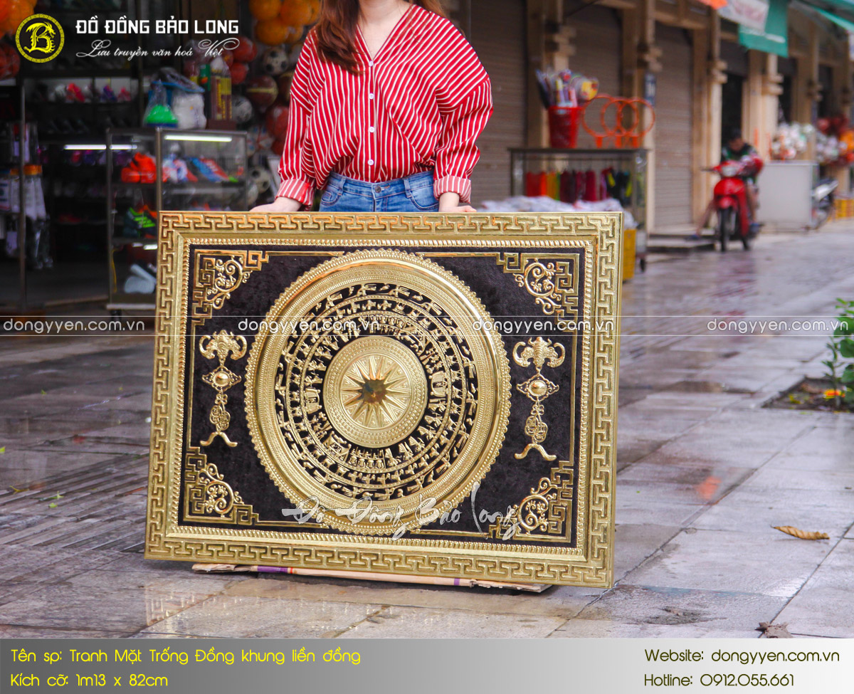 tranh mặt trống đồng khung liền đồng