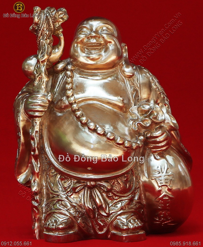 tượng phật di lặc cầm gậy và thỏi vàng cao 18cm