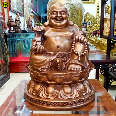 Tượng Phật Di Lặc ngồi đài sen cầm gậy Như Ý bằng đồng đỏ